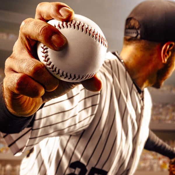 Baseball player pitching