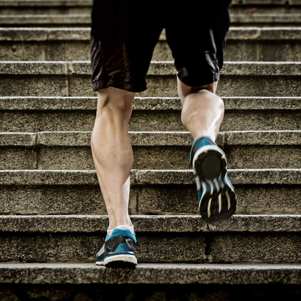 Man running up stairs