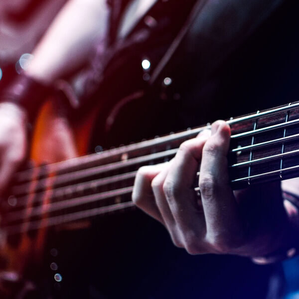 Man holding a guitar