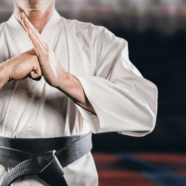 Man with black belt in Karate