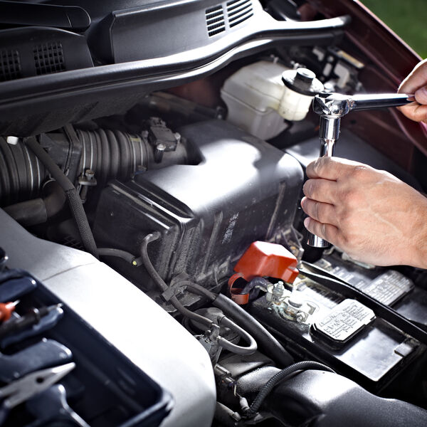 Mechanic working on car