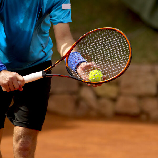 Man playing tennis